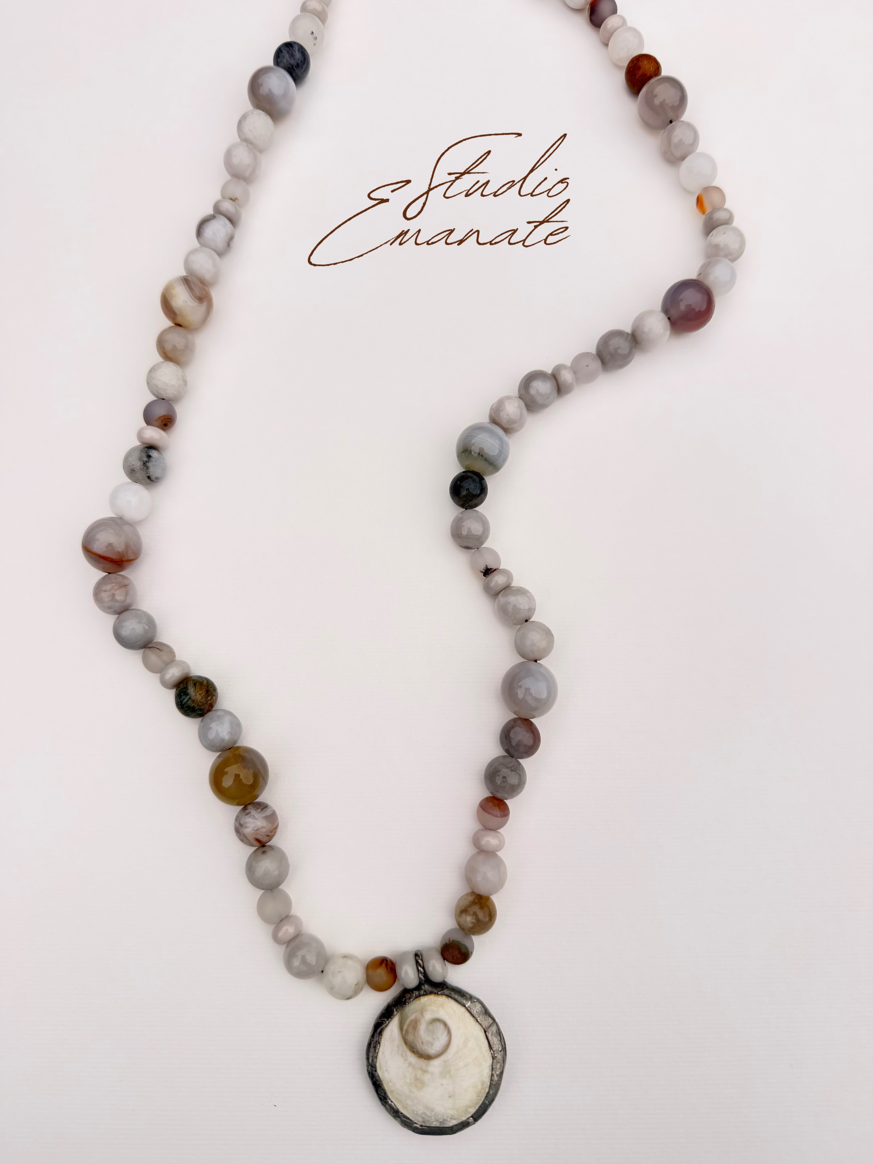 Agate Strand with Spiral Shell Pendant